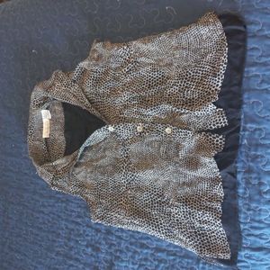 Cute one piece looks like 2 shirts ,other shirt is connected to outside shirt